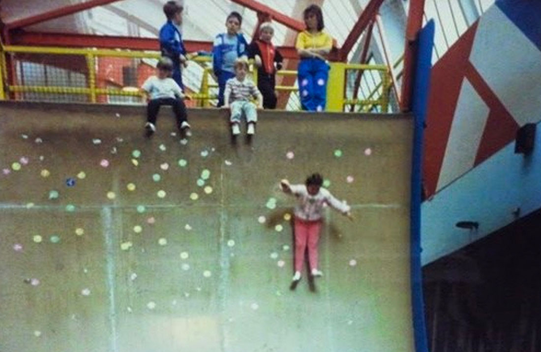 Children sliding down the 'Monster Drop' at Blackpool's Professor Peabody's.