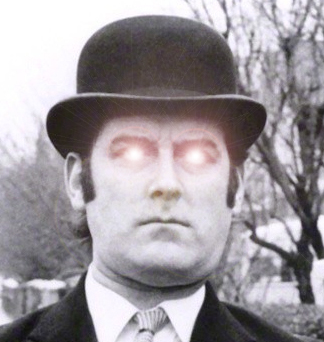 John Cleese with glowing eyes
